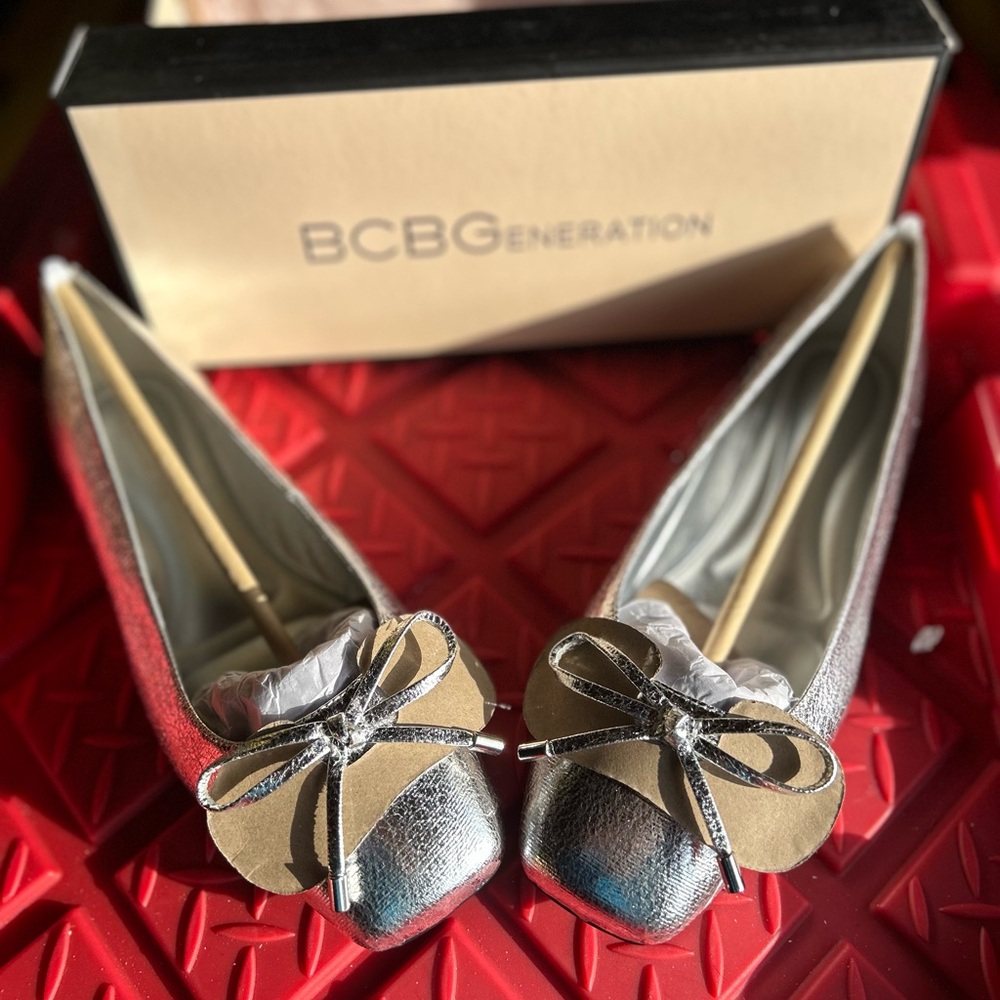 BCBGeneration Metallic Silver Loafers with Bow